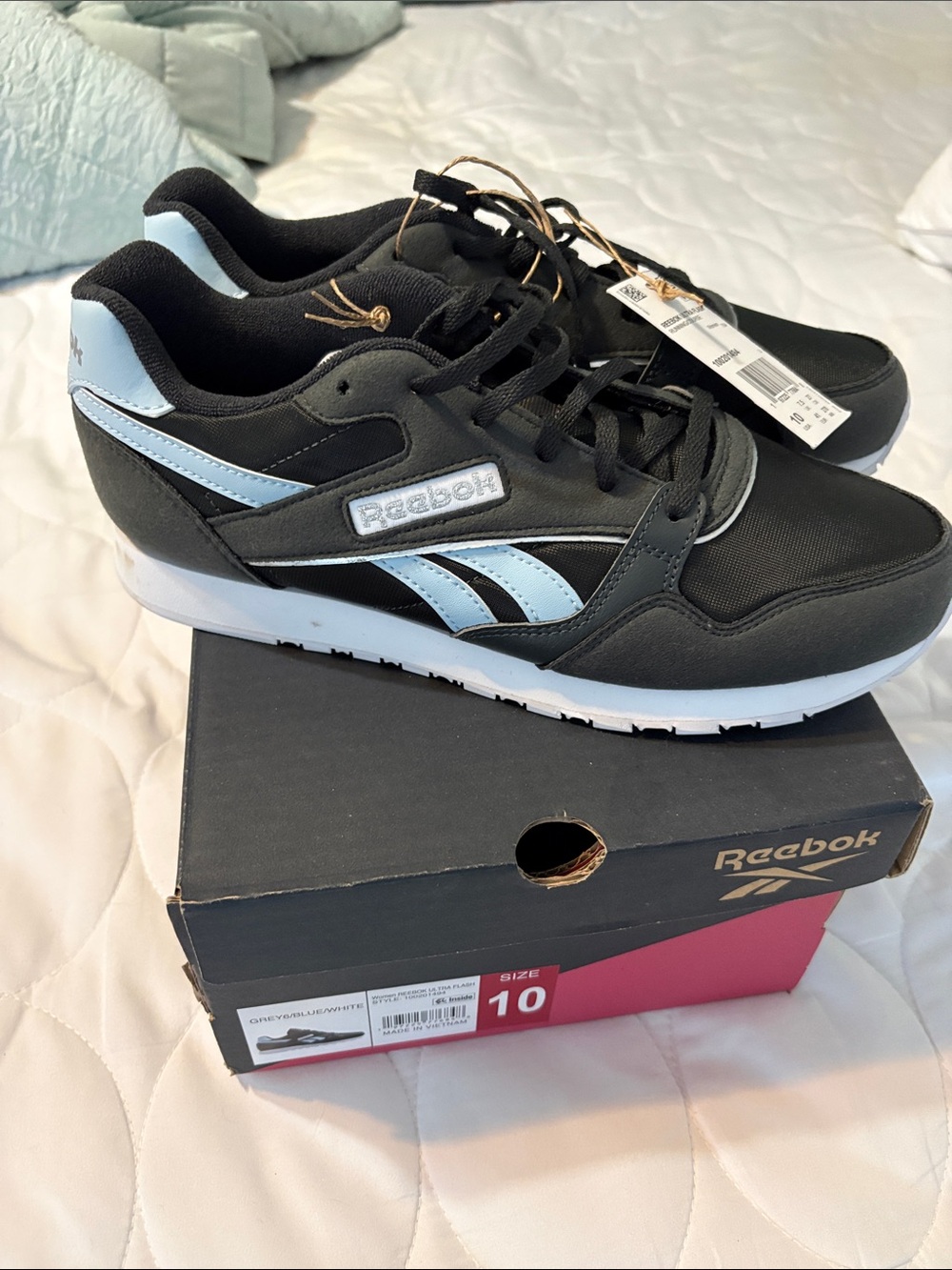 Reebok Black Sneakers with Light Blue Accents